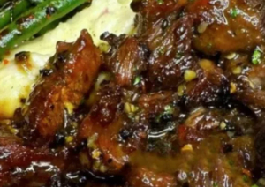 Garlic butter steak bites over creamy