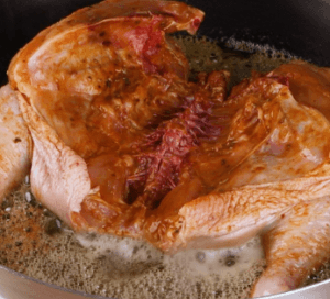 Succulent Marinated and Pan-Fried Whole Chicken
