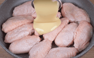 Combine Chicken Wings and Condensed Milk