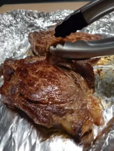 Succulent Seared Ribeye Steaks: A Juicy Olive Oil Infusion
