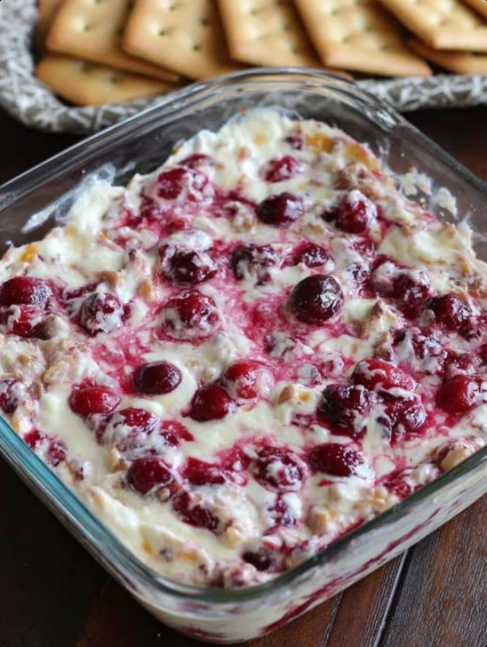 Easy Holiday Baked Cranberry Cream Cheese Dip with gooey cheese & tart berries