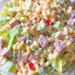 Easy Strawberry Crackle Salad with pretzel-pecan crunch and fresh berries