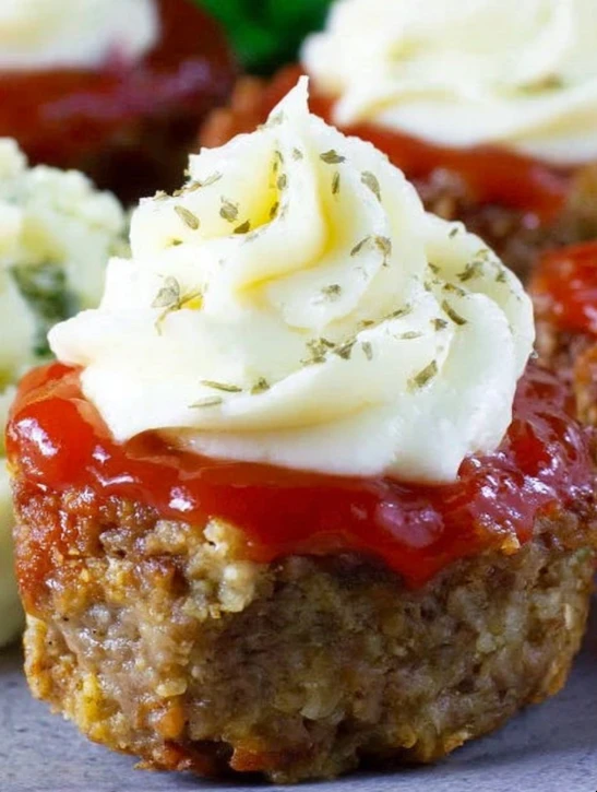 One-Pan Mashed Potato Meatloaf Cupcakes with cheese & bacon topping