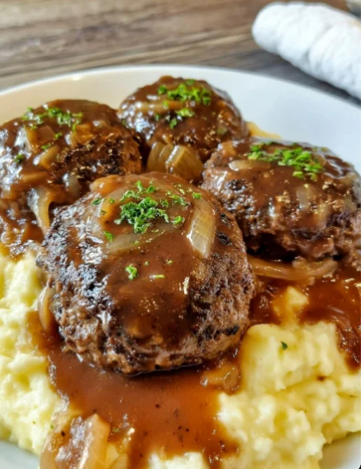 Salisbury Steak with Garlic Mashed Potatoes and Mushroom Gravy